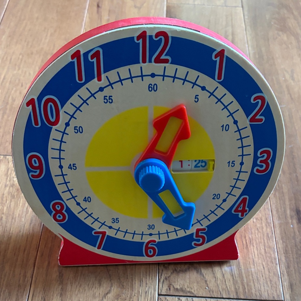 Melissa & Doug Red Turn & Tell Clock